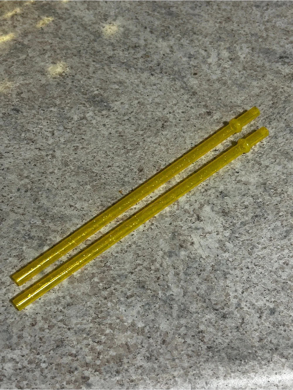 A set of 2 gold disco cups